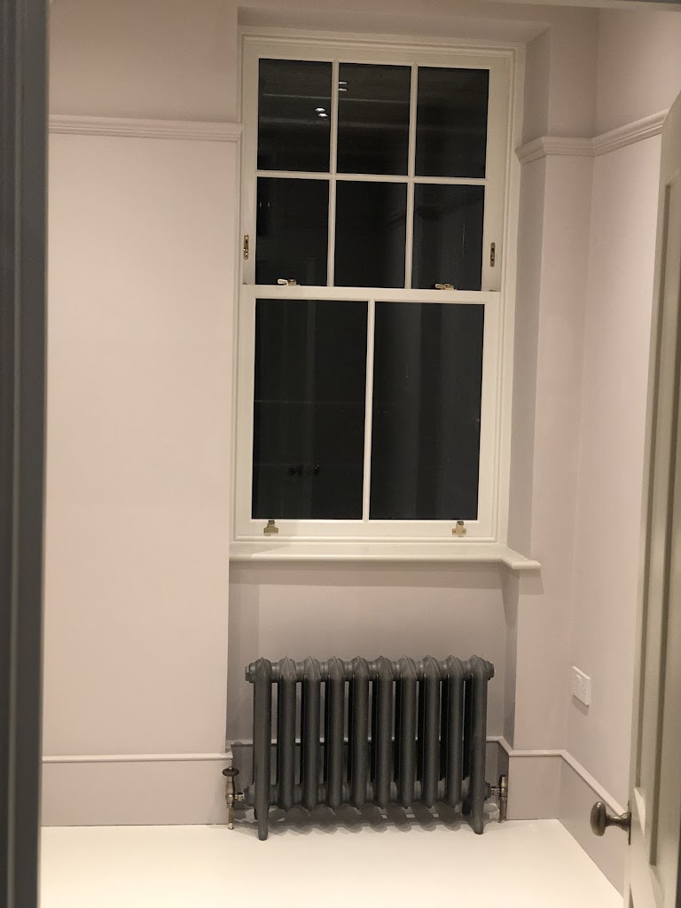 Cast iron radiator installation in Hampstead